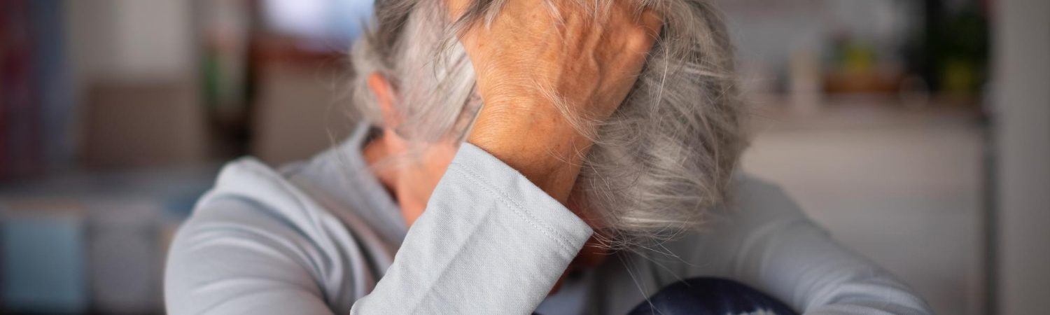 frustrated-depressed-old-woman-covering-face-with-hand-hairs-sitting-couch-home-alone-senior-female-suffering-divorce-bad-relationship-feeling-lonely-depressed
